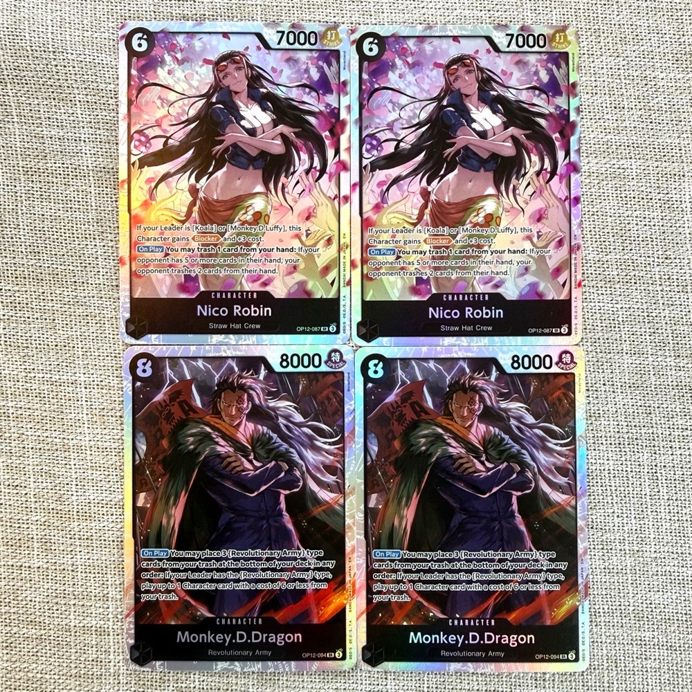 One Piece Nico Robin OP12-087 and Monkey D. Dragon OP12-094 Special Rare Cards